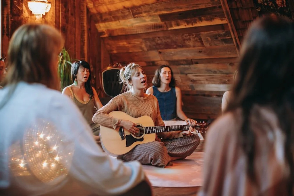 Women gathered in a devotional singing circle