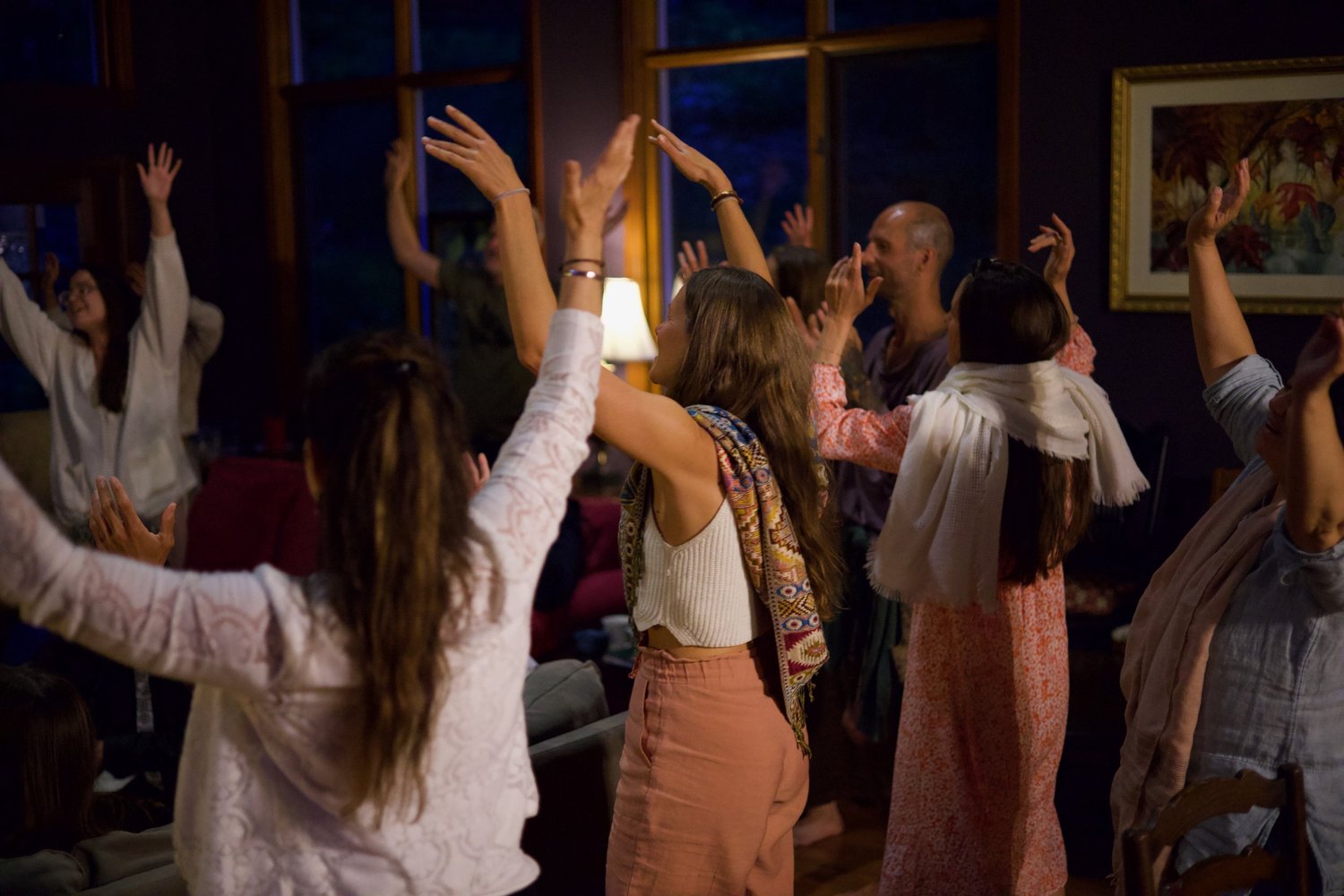 Participants dancing together during a Way of Love retreat